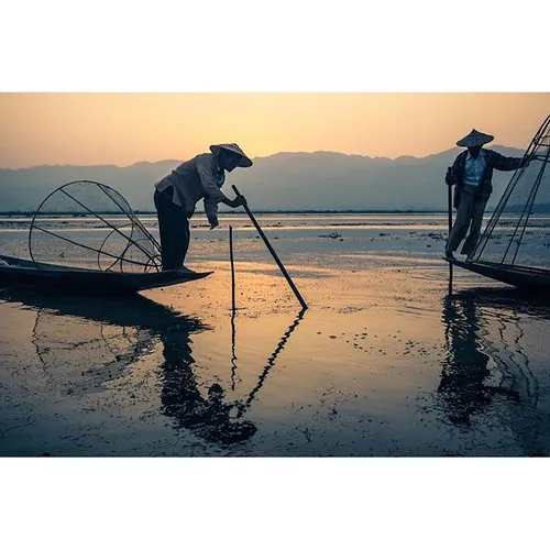 Two Intha fisherman, made famous in publications througho