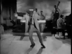 اجرای مون واک توسط بیل بیلی در سال ۱۹۵۵ در نیویورک، ۲۸ سا