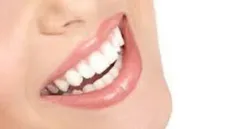 نخ دندان برای رسیدن فلوراید خمیر دندان به داخل شیارهای د