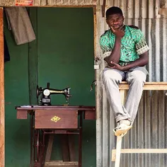 A local Tailor at his store in Bassan Jiwa, a community o