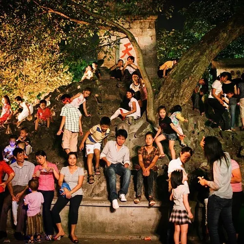 People hang out at Thap But in Hanoi, Vietnam, as some of