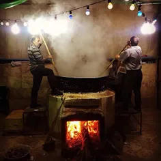 Men making Samanu (a traditional sweet paste made entirel