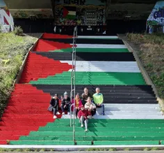 Activists paint the steps underneath Foyle Bridge in Derr