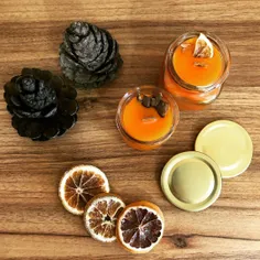 شمع پرتقالی با عطر دارچین