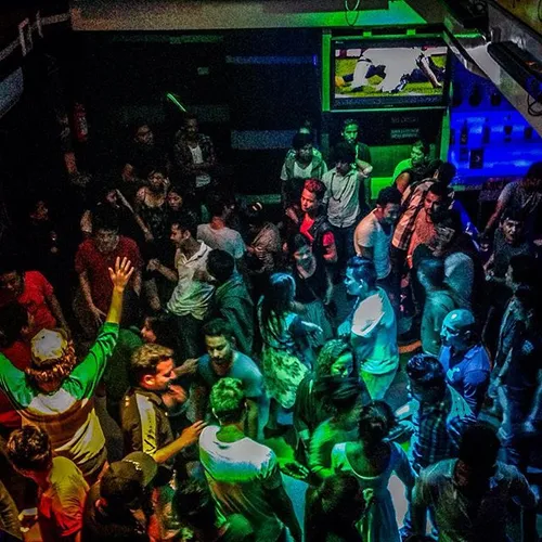 People dance in a nightclub in Kathmandu, Nepal, a month 