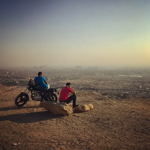 A pair of friends share a quiet moment at Mokkatam Hill i