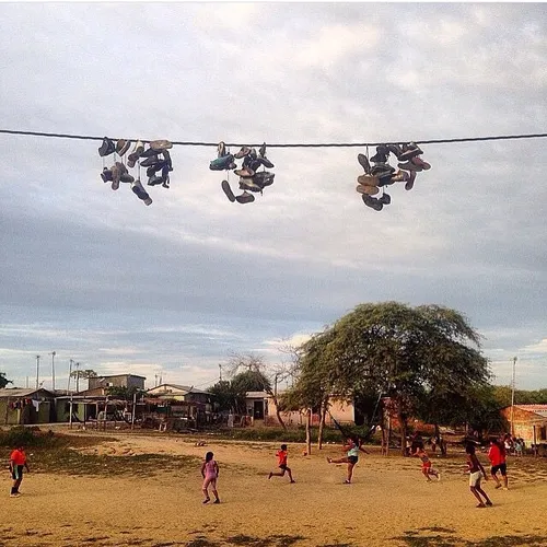 A women's soccer match on a field in the Guayas province.