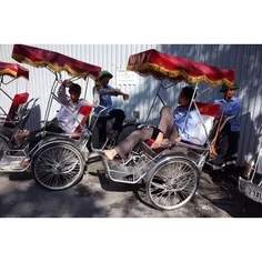 Cyclo or rickshaw drivers gathers to get rest while waiti