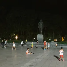 Children are playing on the playground of Lenin square in
