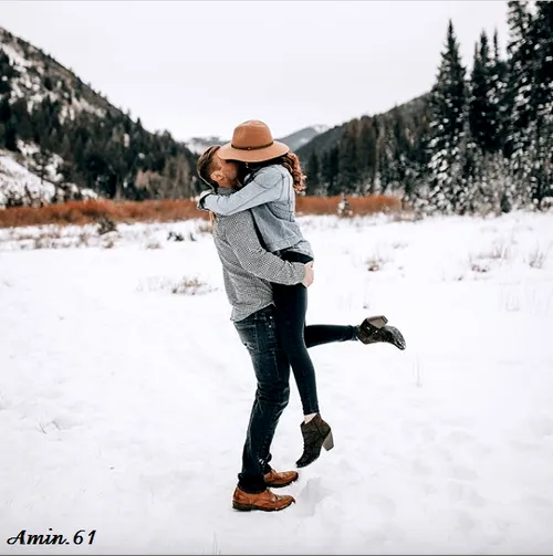 winter girl and boy kiss