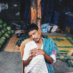 Watermelon seller, taking rest after hectic day.