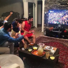 A family watches a volleyball match on TV. #Tehran, #Iran