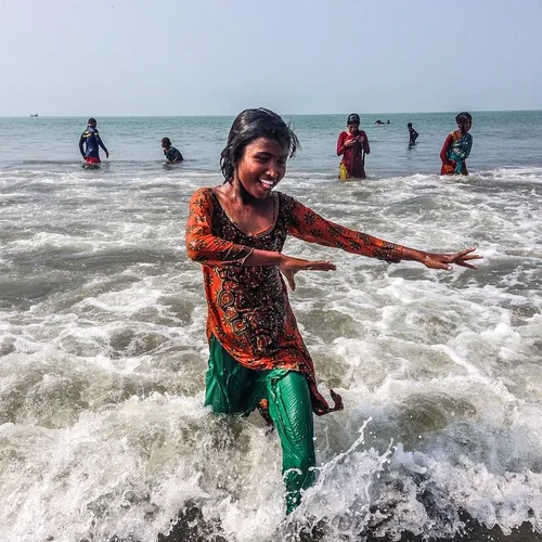 10 year old Johanara dances as she exists the water durin