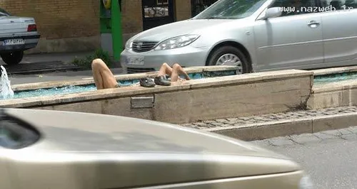 عکس های عریان حمام کردن مردی در بلوار دانشجو!!