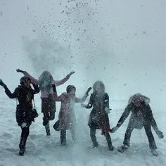 Young women have fun in the snow. Mount Tochal, #Tehran, 