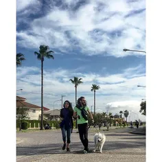 A young couple are walking their gorgeous #dog, #Khazarsh