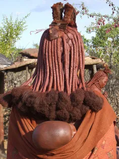 #مدل موی زنان قبیله هیمبا که با گل اینگونه موهای خود را م