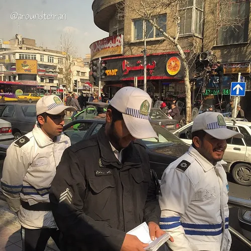 Cheerful traffic police near Ferdosi | 27 Feb '15 | iPhon