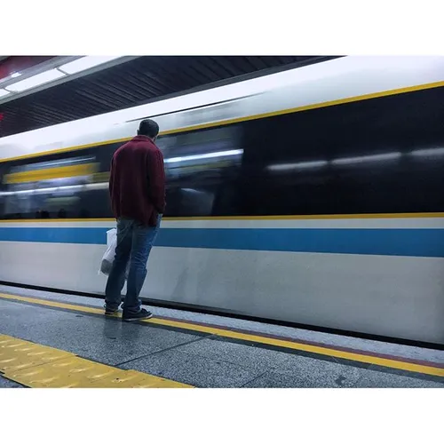 Train is approaching the platform at an underground stati