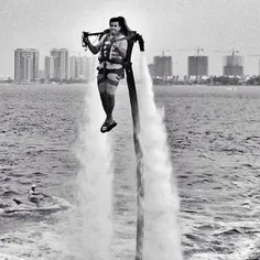 A man has fun in the coastal waters of Kish Island. #Pers