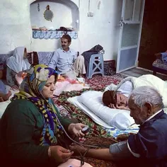 Photographer’s mom checks his grand pa’s blood pressure a