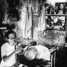 Street barber's in a small alley of inner-citadel of Hue 