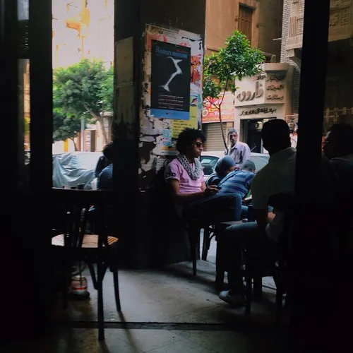 Photo by @alexkpotter - Young Egyptians hang out at a caf