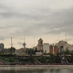 The #Milad tower is seen through nearer buildings from th