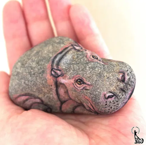 نقاشی حیوانات روی سنگ