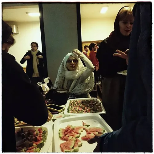 A group of students celebrating Shabe Yalda while a stude