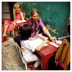 An outdoor elementary class, one to one. 70 years old ret