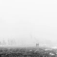 A couple walks on a snowy day. #Tehran, #Iran. Photo by @