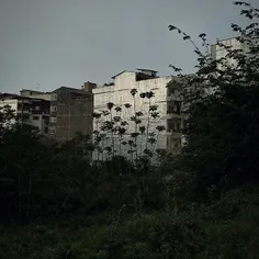 The side of a home is covered with aluminum sheets to pro