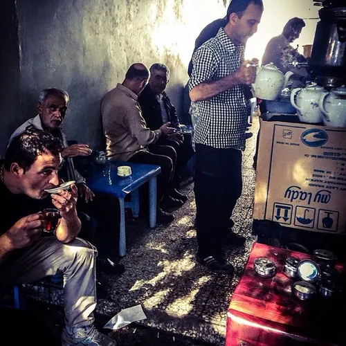 Men drinking tea at a traditional café in Bandar-e Anzali