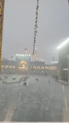 در بحبوحه بارش شدید باران و تگرگ در مشهد، تصاویری از نجات