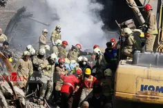 پیکر هشتمین آتش نشان شهید از زیرآوار پلاسکو خارج شد