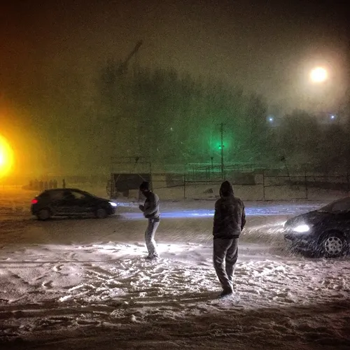 Young people dancing on the snow in Tabriz, Iran.