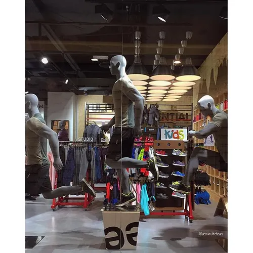 Mannequin in motion. The Reebok store at the Palladium sh