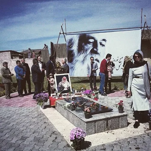 People visiting MohammadReza Lotfi's tomb, an Iranian wel