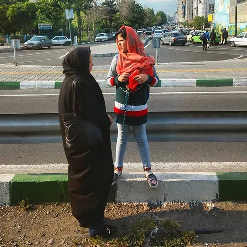 Mother and daughter along the street are waiting!