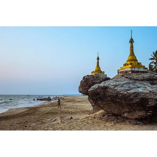 "Rock Pagoda," a tourist attraction, at sunset on Ngwe Sa