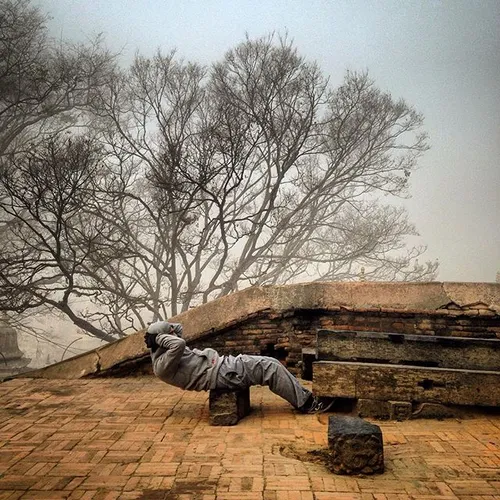A Nepalese man does his morning workouts near Pashupatina