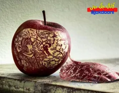 کار هنری روی سیب...