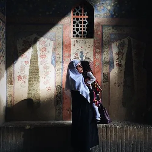 A woman and her daughter at Vank cathedral, one of the fi