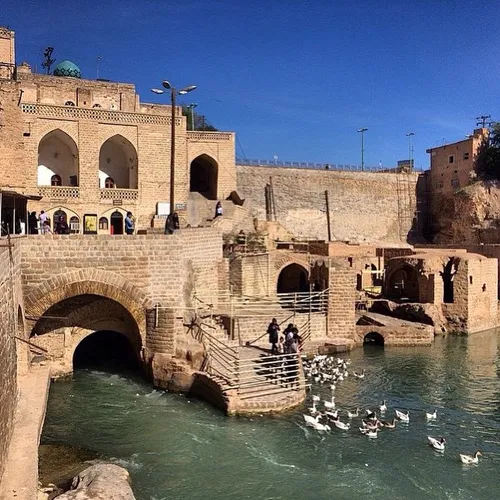 Visitors at Shushtar Historical Hydraulic System, an anci