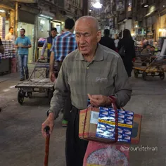 An old man is selling things in the grand #bazaar of #Teh