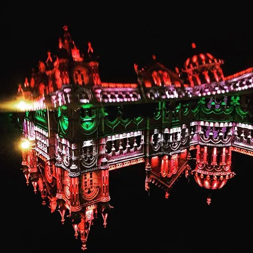 Reflection of Chhatrapati Shivaji Terminus is seen as it 