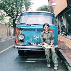 A carpenter poses for the photographer before going to wo