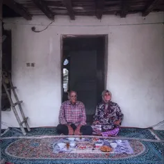 An old couple ready for eating #Iftar outside their house