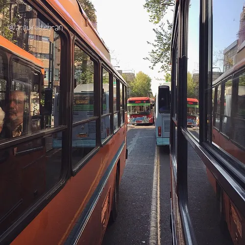 Buses narrowly move past each other on a BRT lane. | 6 Ap